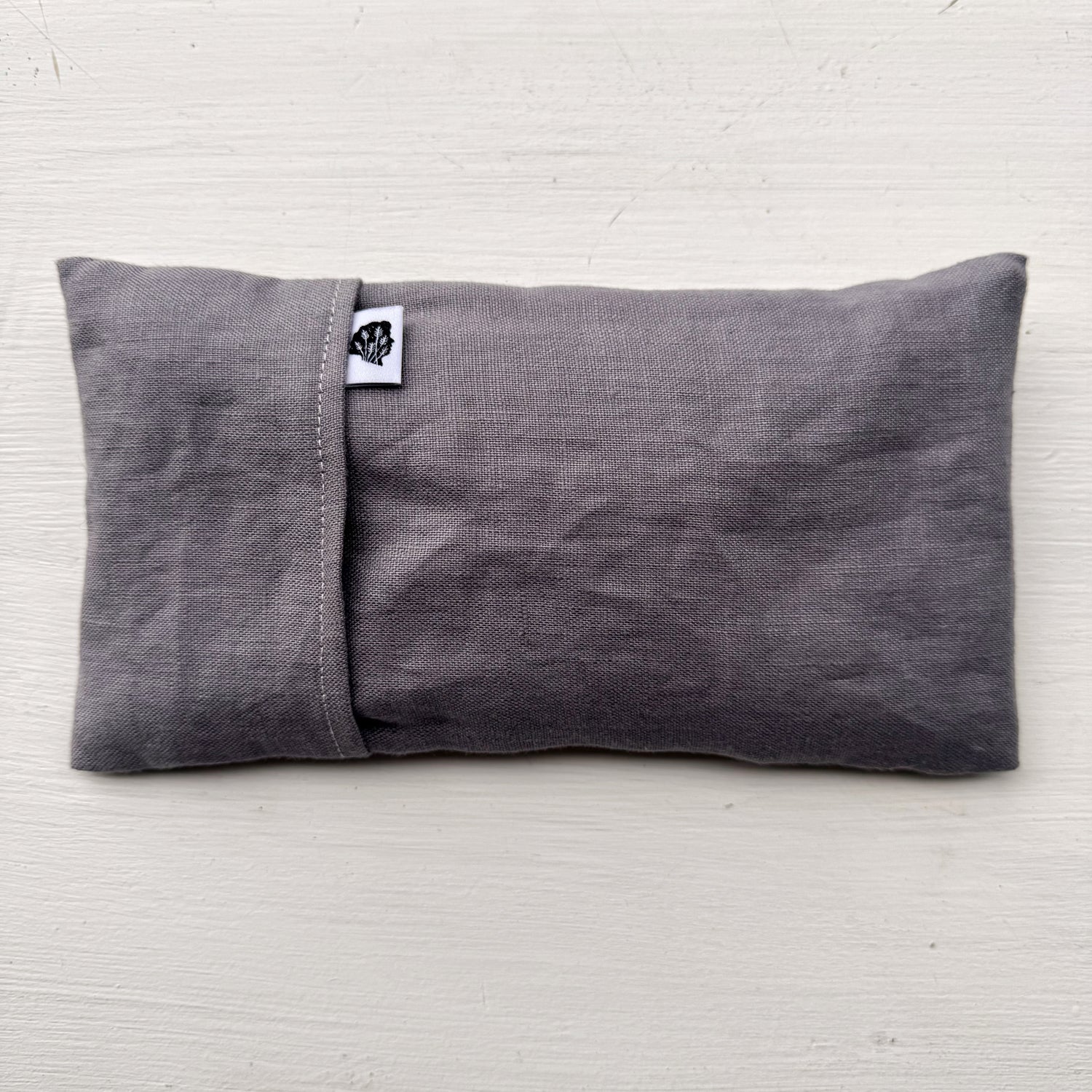 Grey eye pillow i crinkled grey linen with TLC tag