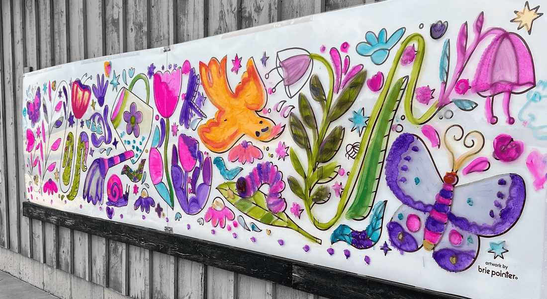Colourful mural of flowers, birds and butterflies