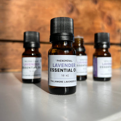 Amber bottle with black cap and label that says "Phenomenal Lavender Essential Oil"