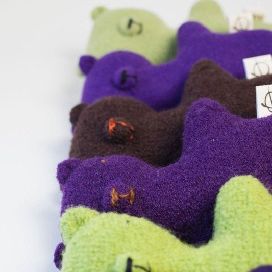 Close up of five teddy bears in a row