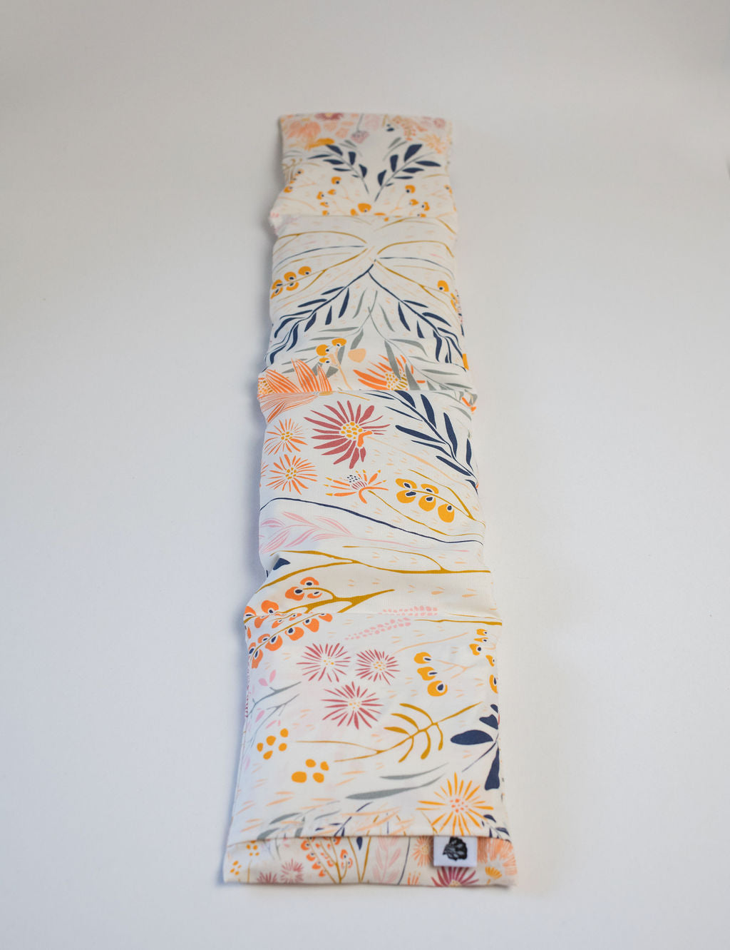 Light floral wrap laid on white background